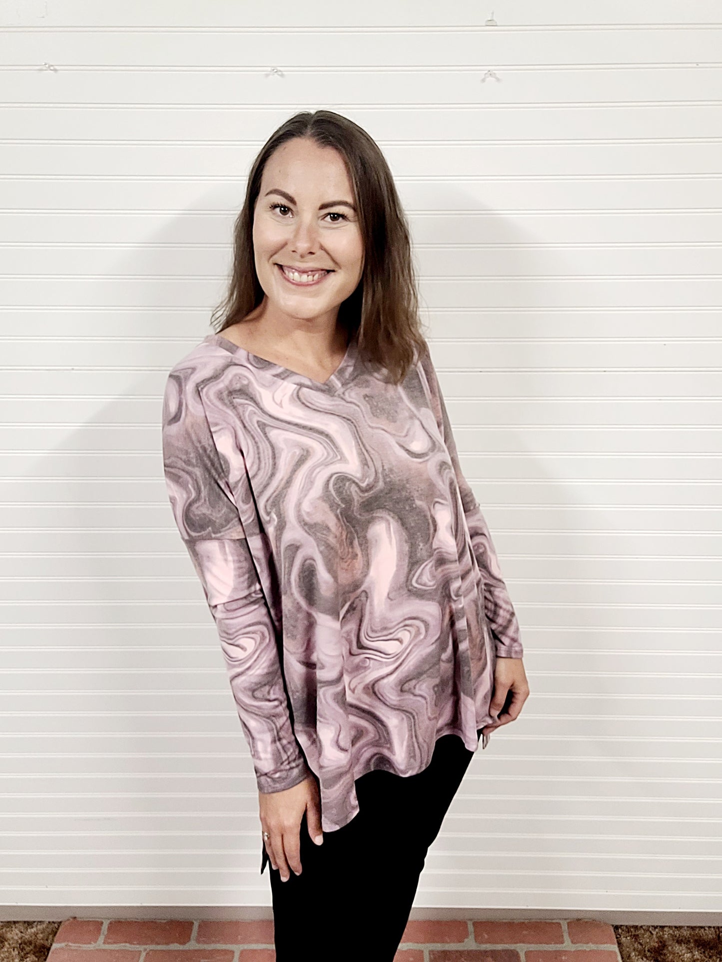 Zenana Printed Dolman Long Sleeve V Neck Hi-Low Hem Top