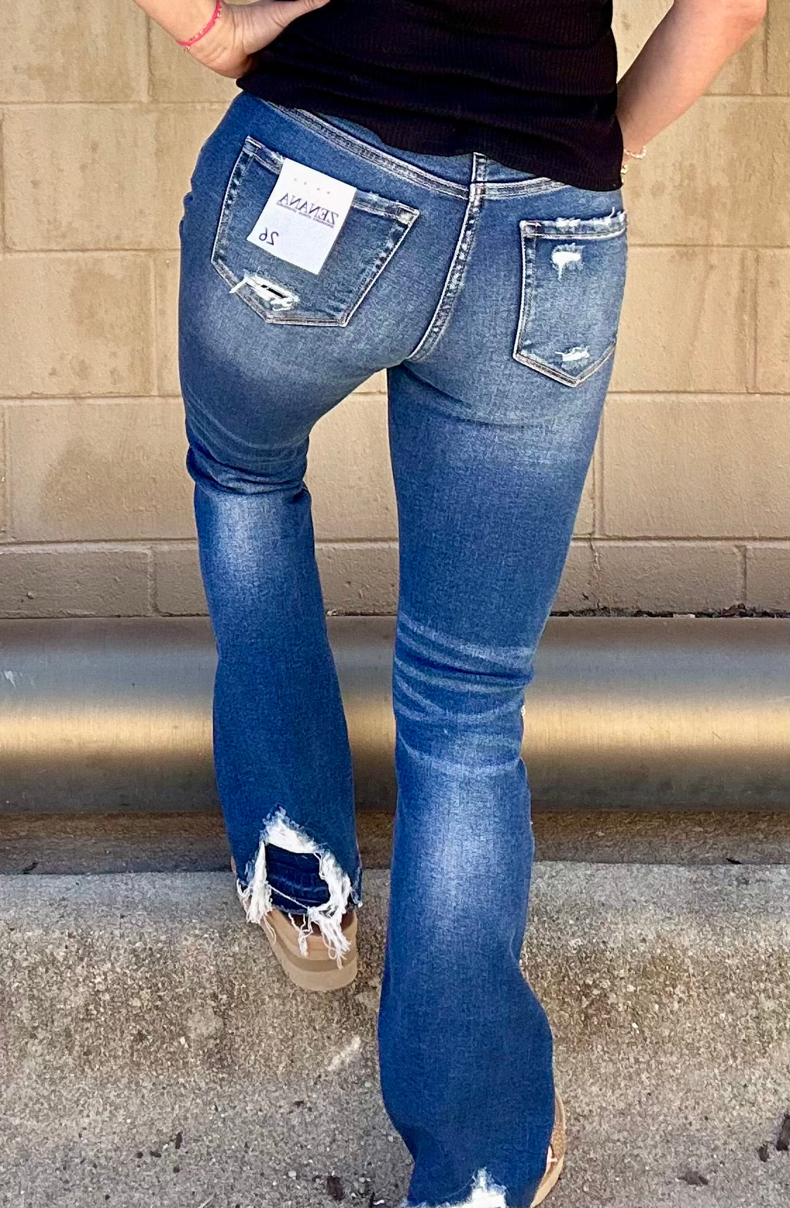 Distressed Patched Hem Flare Jeans